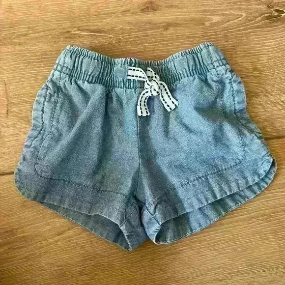 5/$10-Carters Baby Girl Blue Jean Paperbag Shorts Size 9 Months - Picture 1 of 3